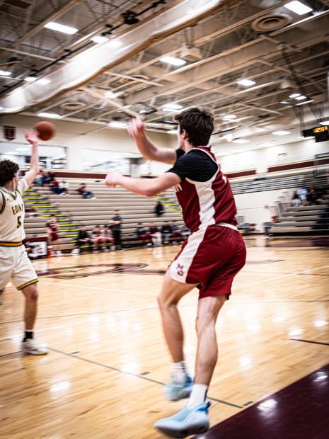 Basketball player passing during a fast break